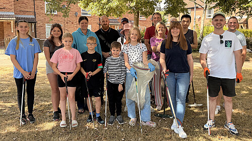 East Marsh residents, children and volunteers taking part in a community clean-up around Victor Street.