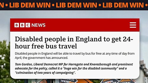 Liberal Democrat campaigners celebrating the announcement of 24-hour free bus travel for disabled people in England from April 2027.