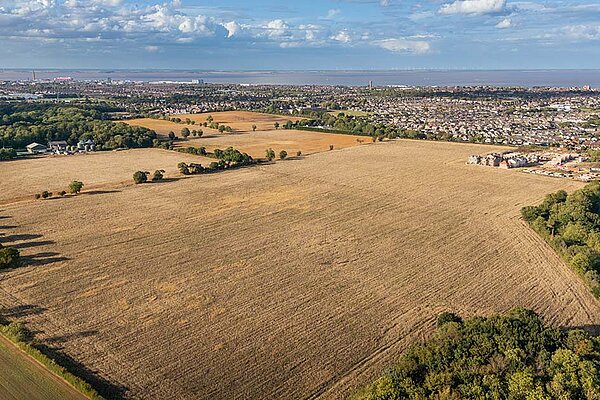 Aerial view of the proposed site for approximately 1,500 homes next to Weelsby Woods.