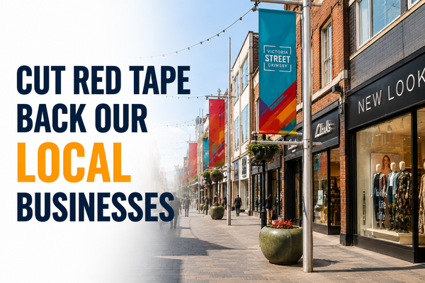 Grimsby town centre shops with the message Back Local Business – Cut Red Tape.
